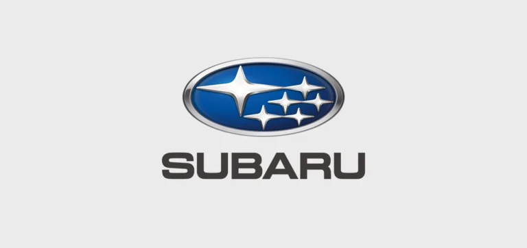 Subarus logotyp med blå bakgrund och sex silverstjärnor.